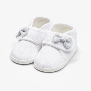 Kojenecké capáčky s mašličkou New Baby bílá 12-18 m velikost 12-18 m